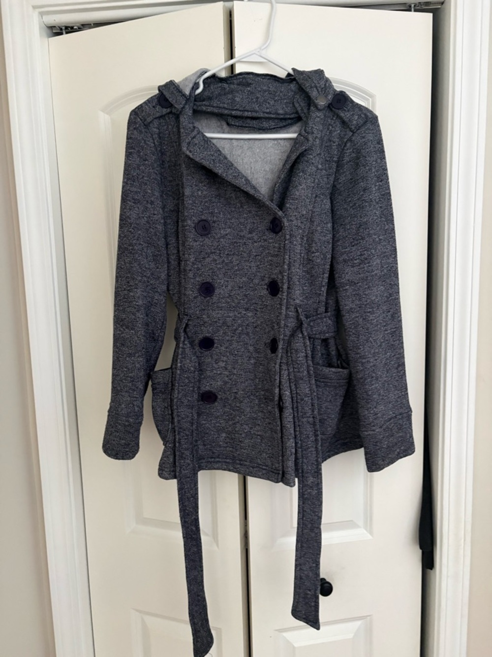 Wet Seal jacket with tie waste and removable hood. Size Large. Like new.